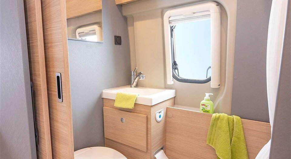 Spacious bathroom | With large mirror, it offers all amenities