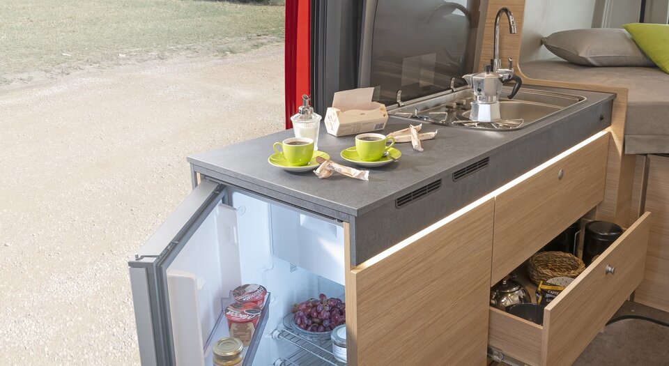 Easy access | Double-hinged refrigerator for easy access from inside and outside the vehicle
